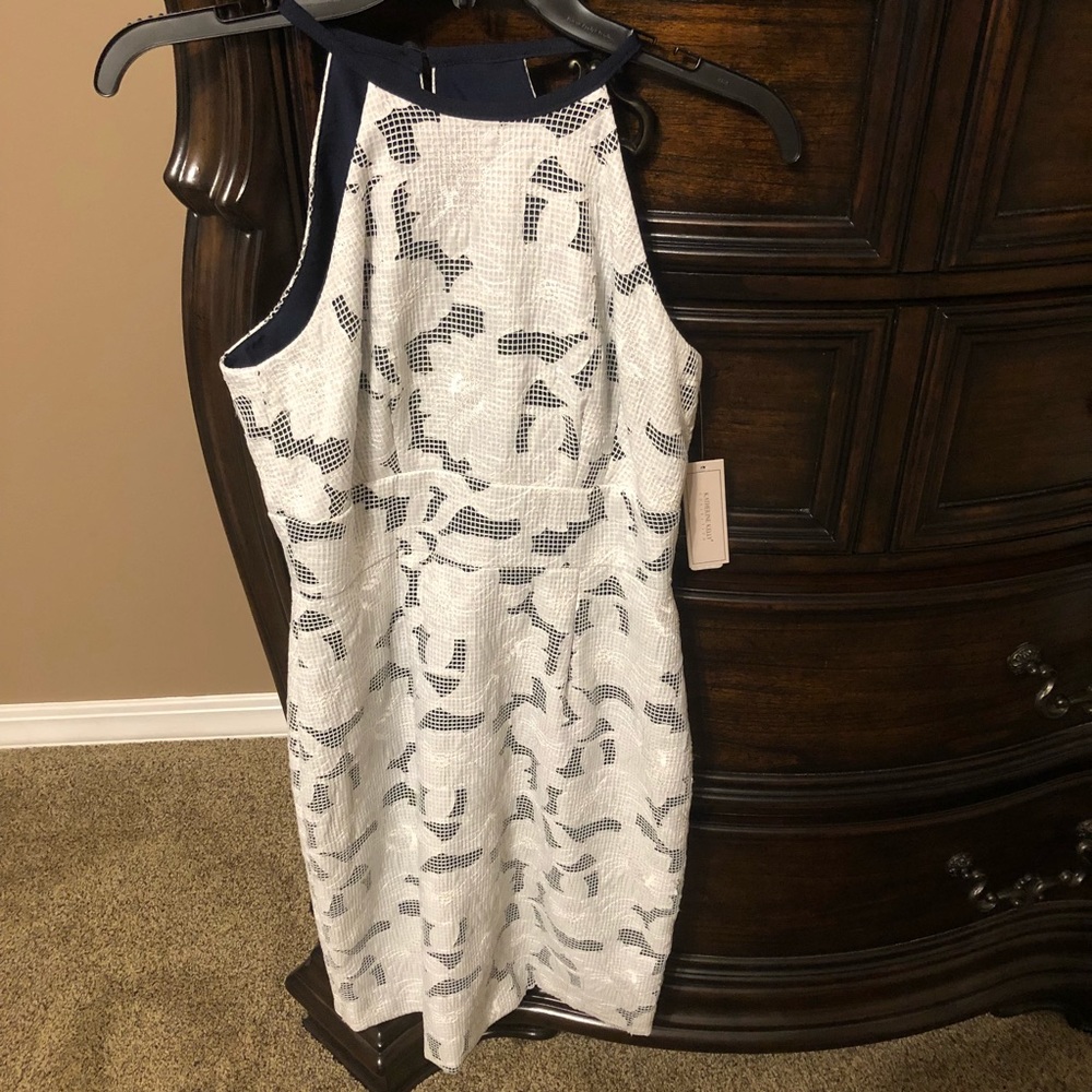 Navy dress with white lace overlay